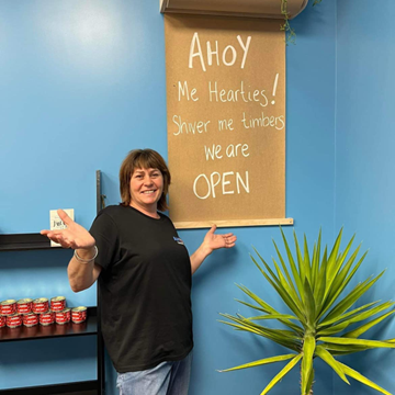 Lady by menu in shop 