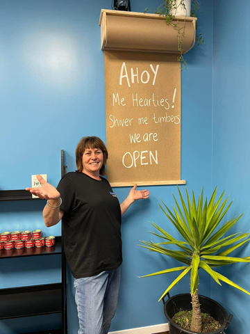 Lady by menu in shop 