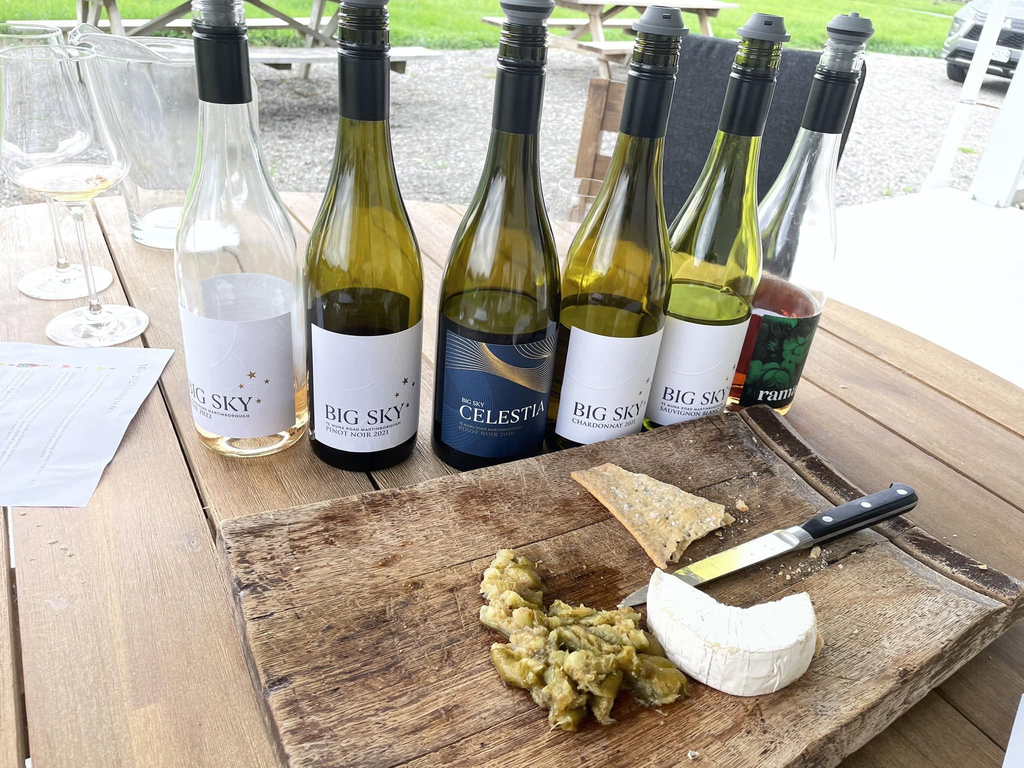 Selection of wine bottles in front of platter 