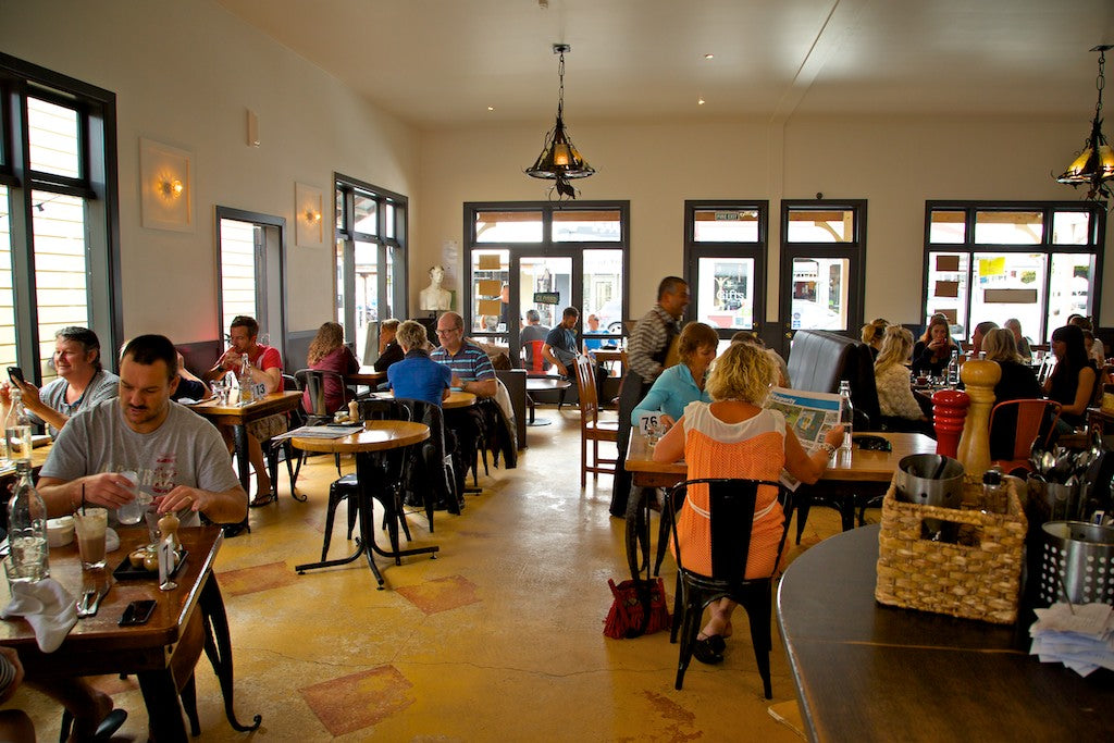 People eating at tables  