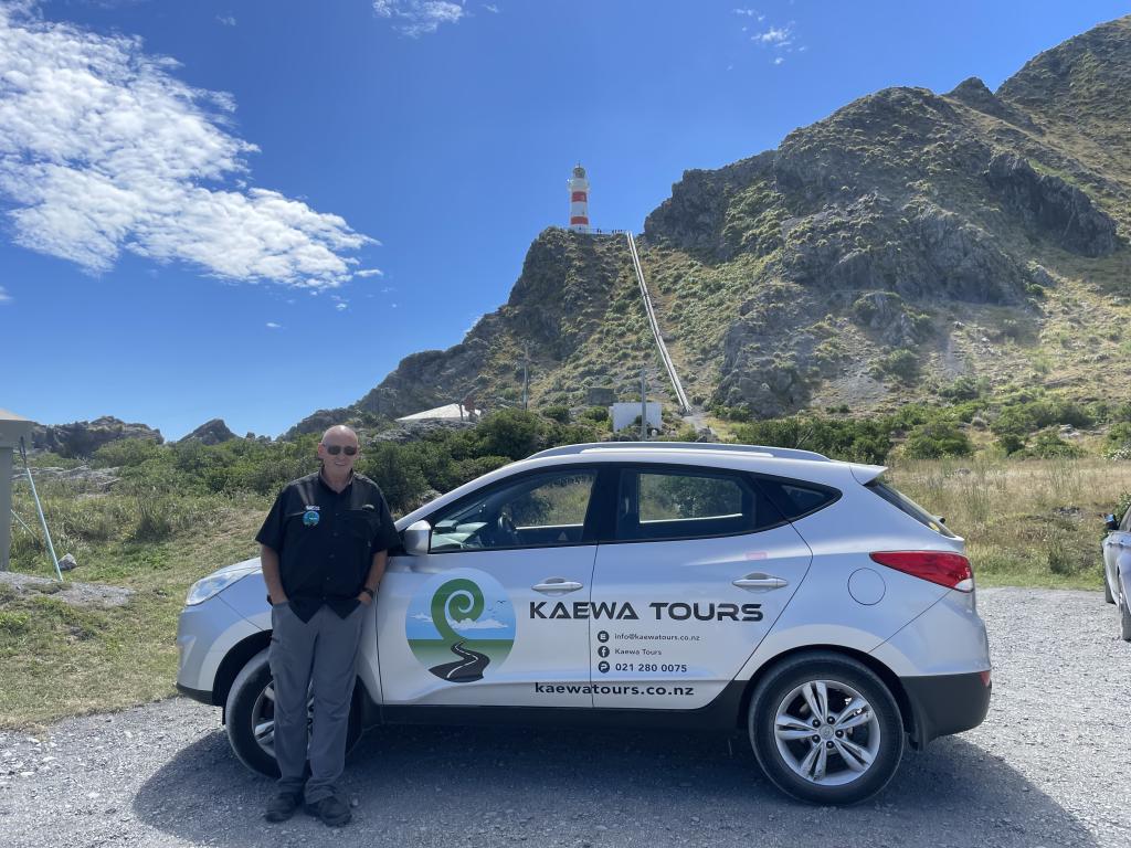 Tom, your Driver/Guide at Cape Palliser lighthouse, the most southern point of the North Island.