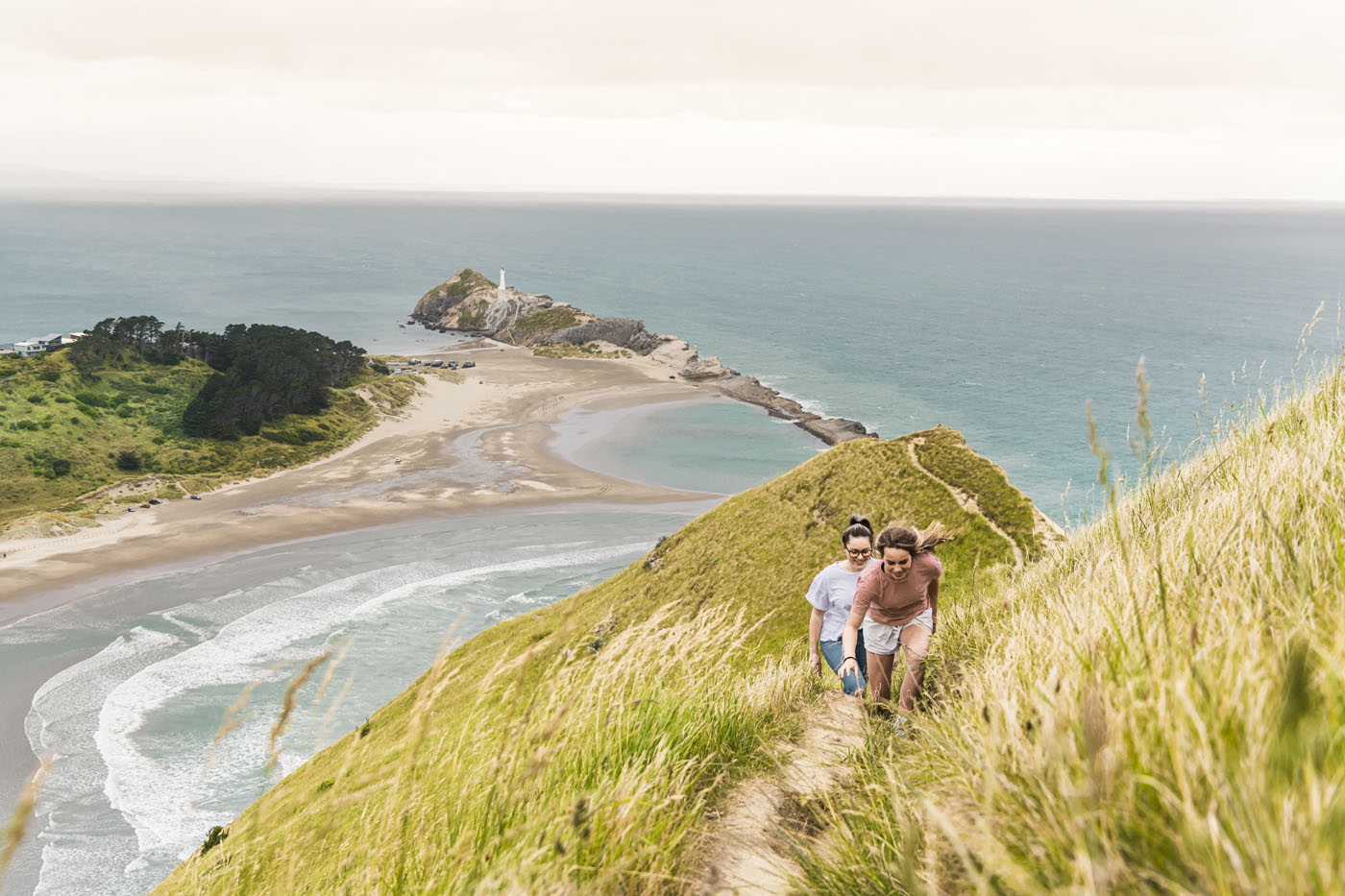 Girls walking up track to Castle Rock 