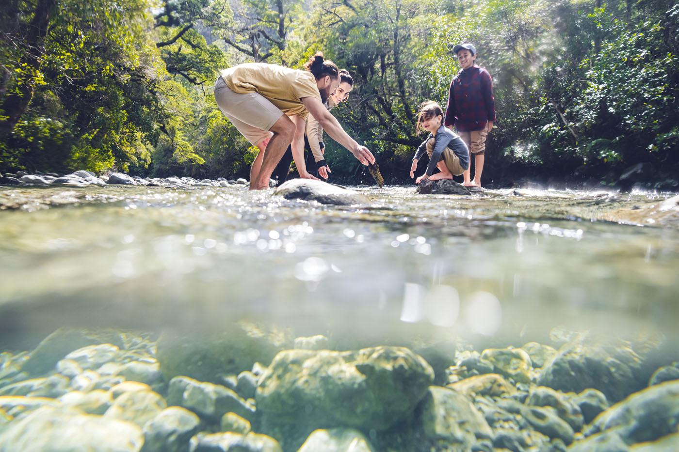 Family exploring the river 