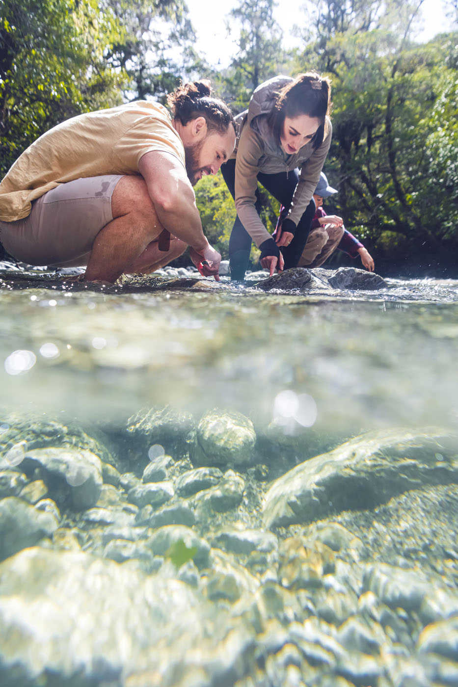 Family exploring the river 