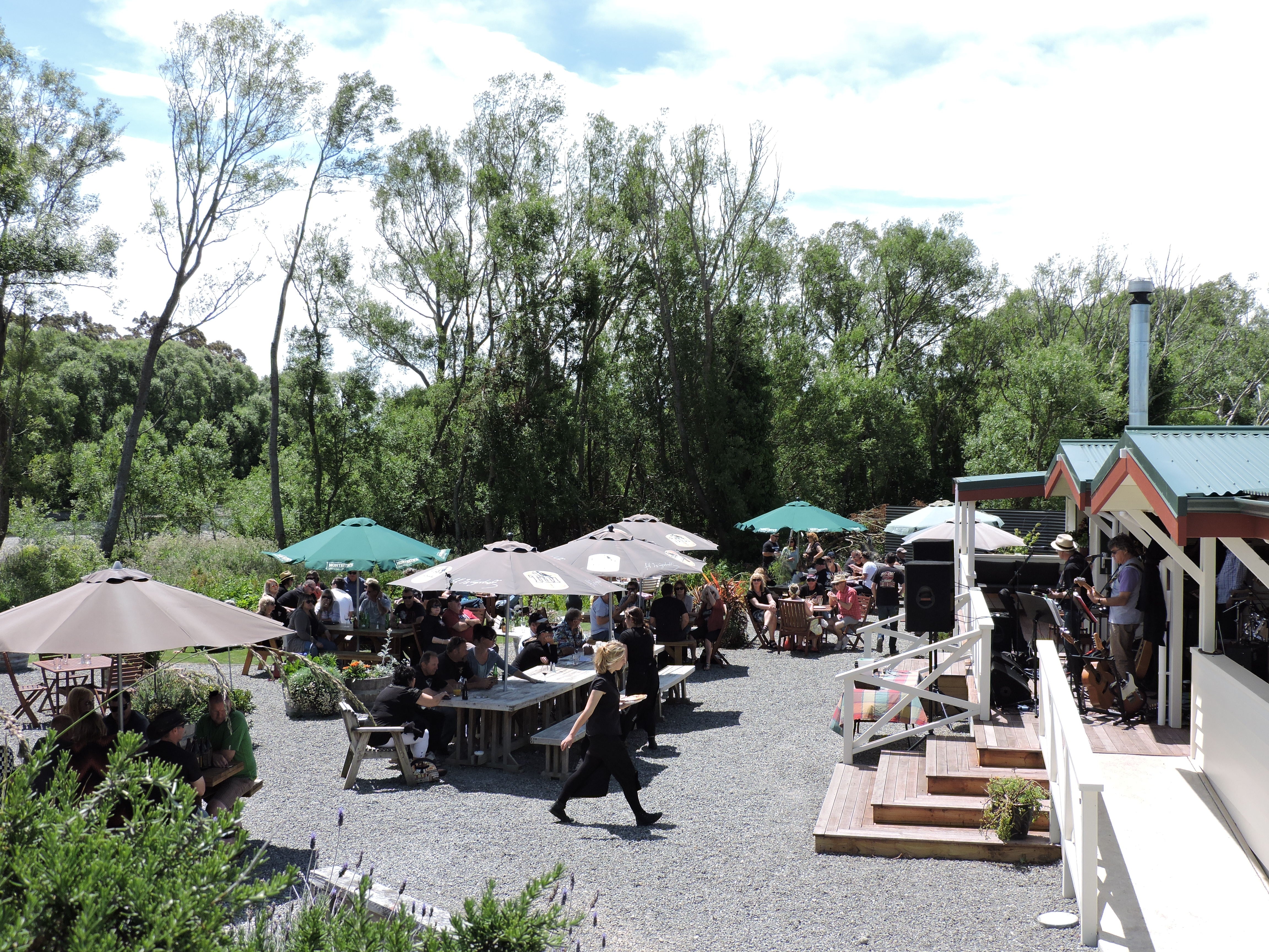 People in the sunny garden courtyard 