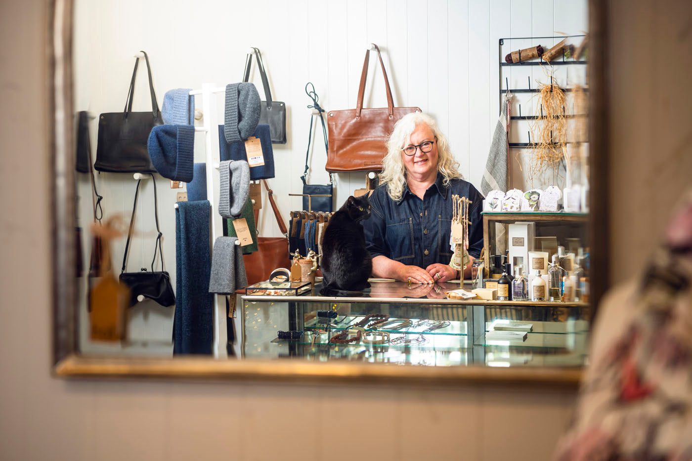 Lady and cat at counter