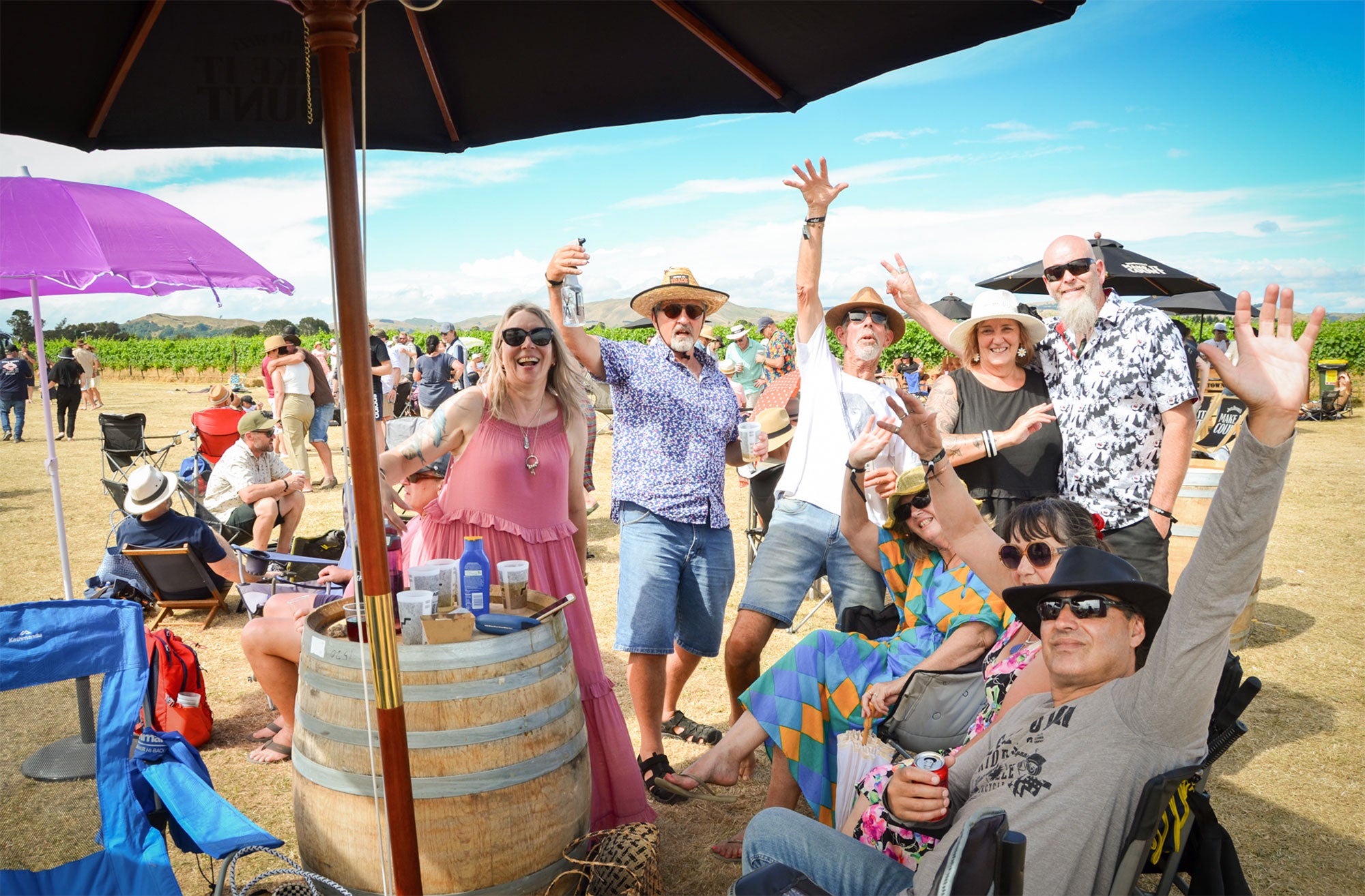 People waving to the camera