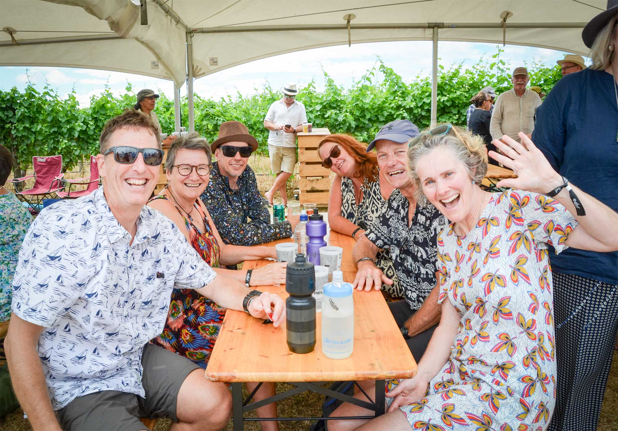 Table of people smiling for the camera