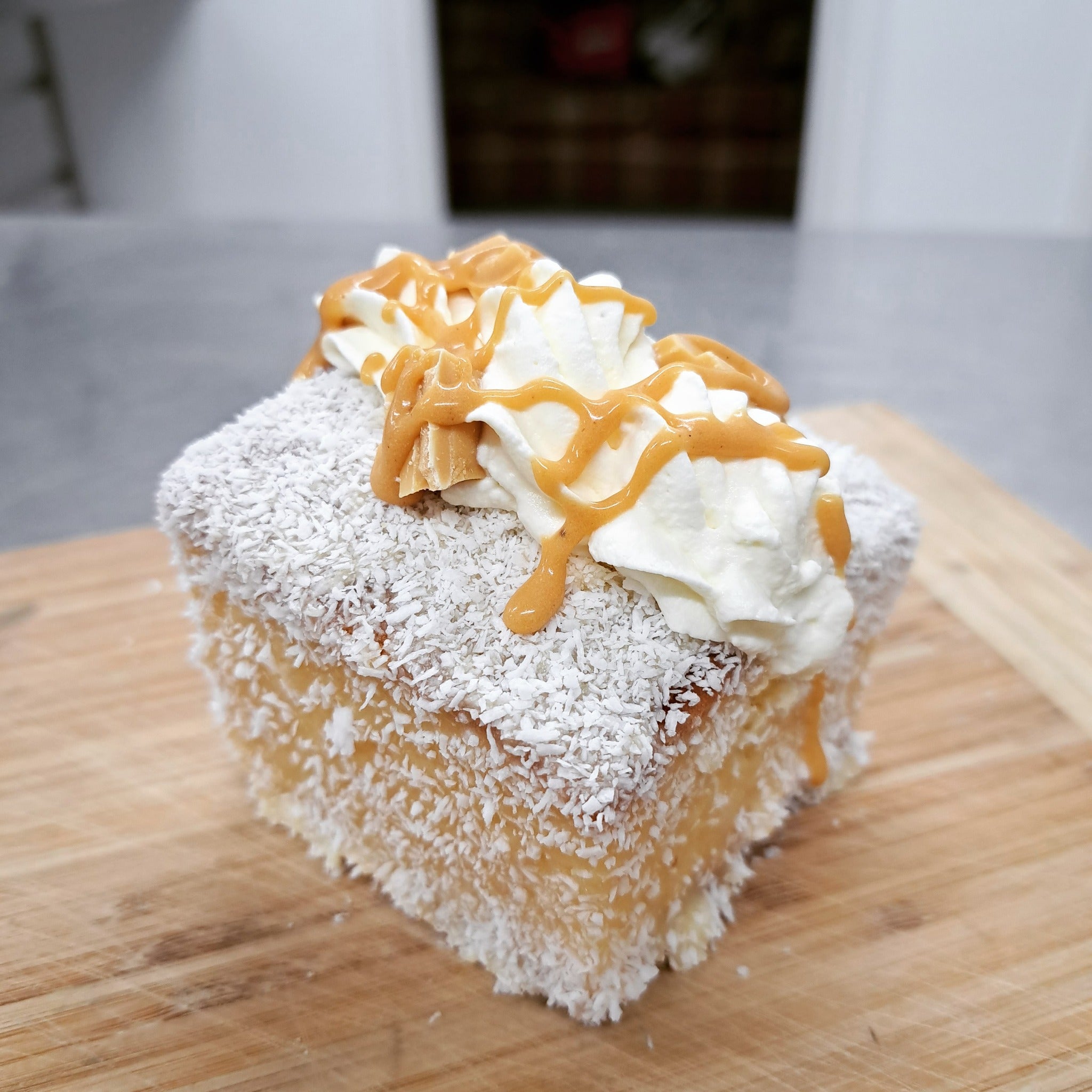 Lamington with whipped cream 