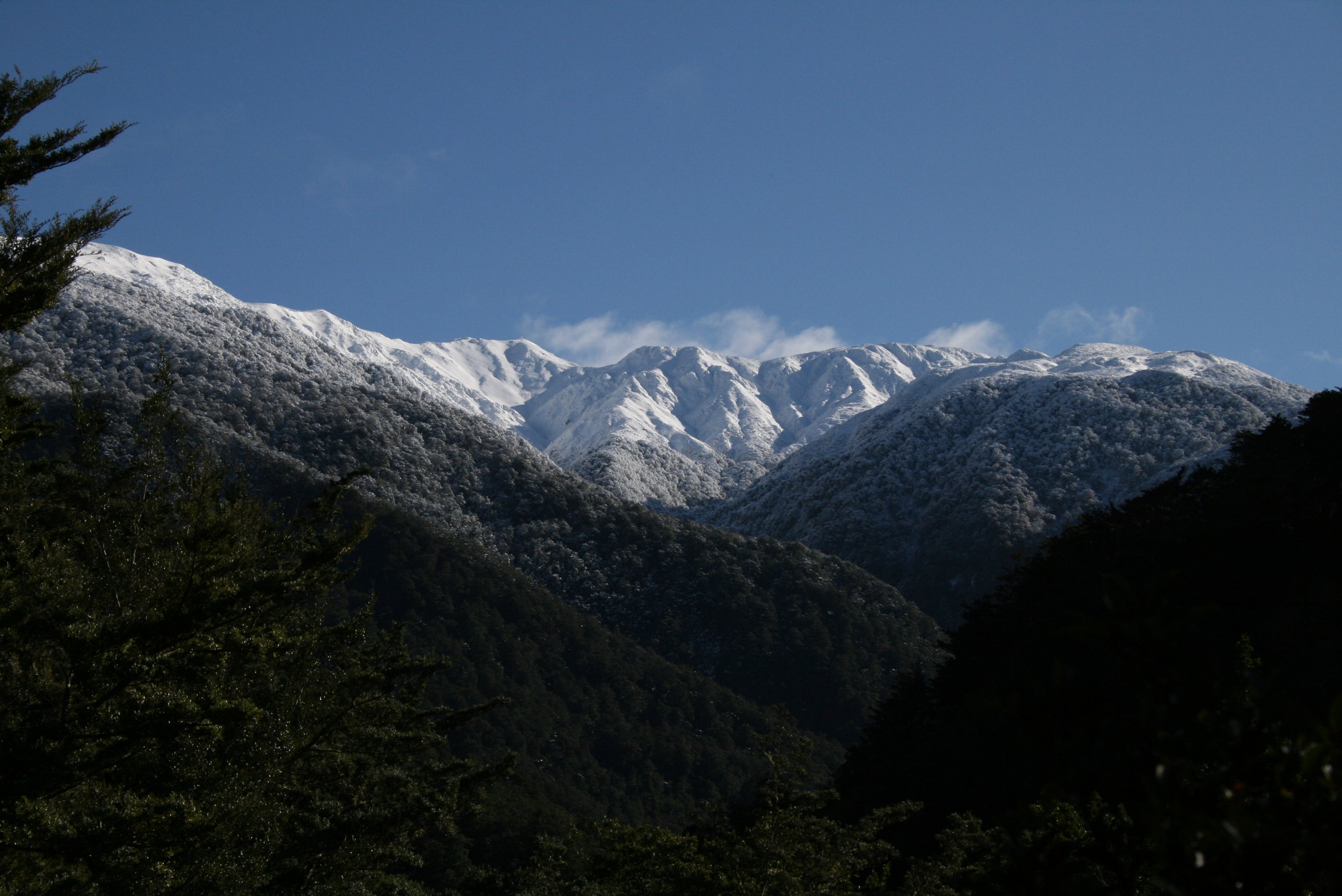 A high mountain covered in snow 