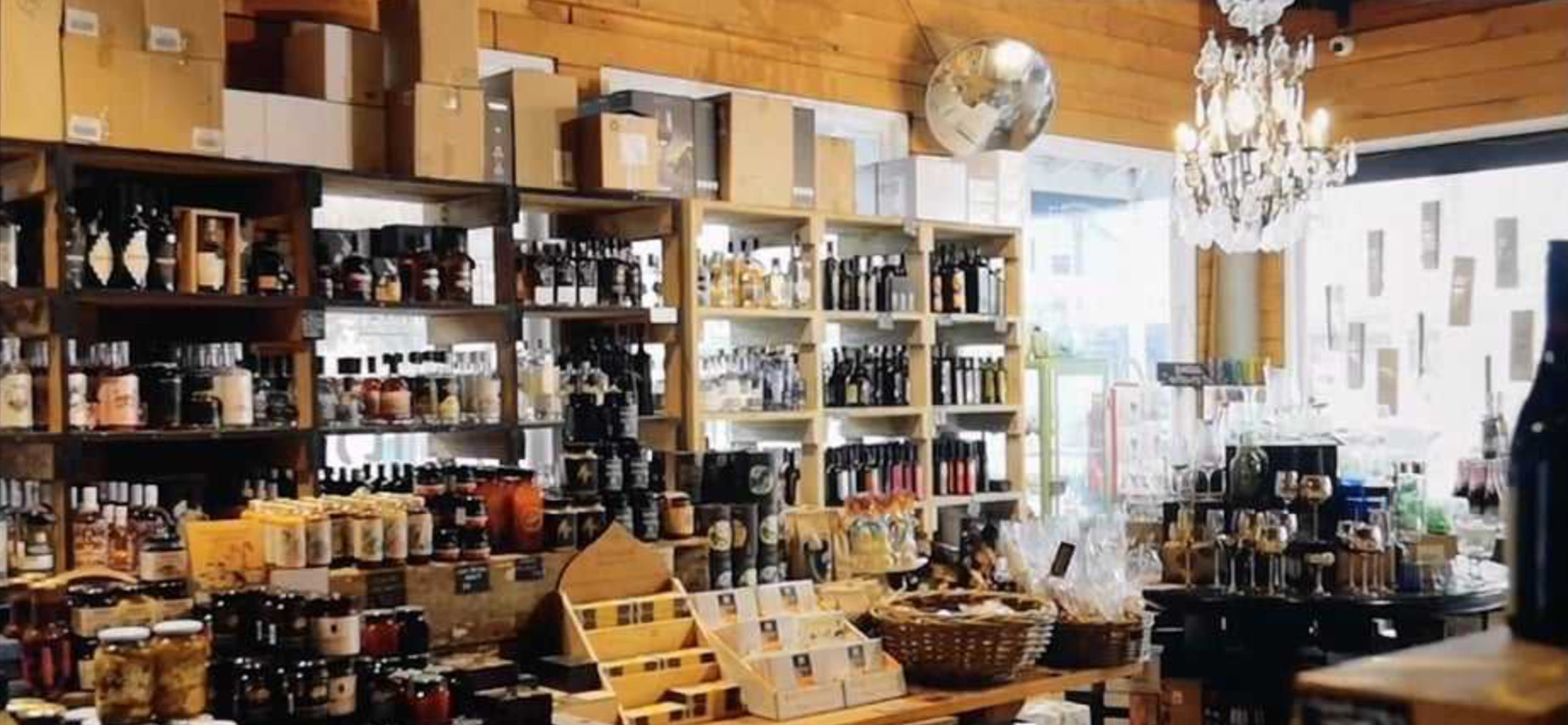 Shelves in a shop full of wine