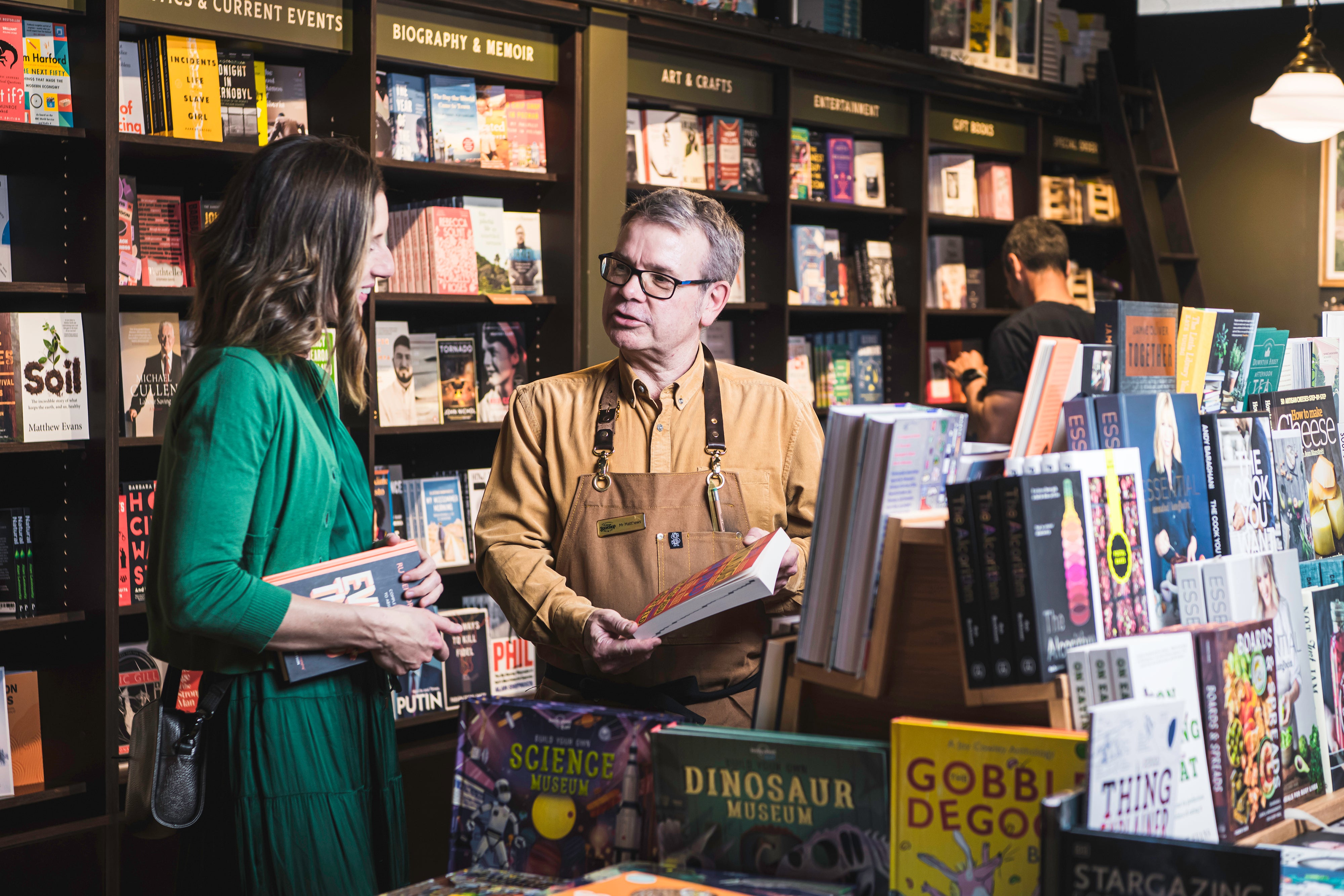 People looking at a book 