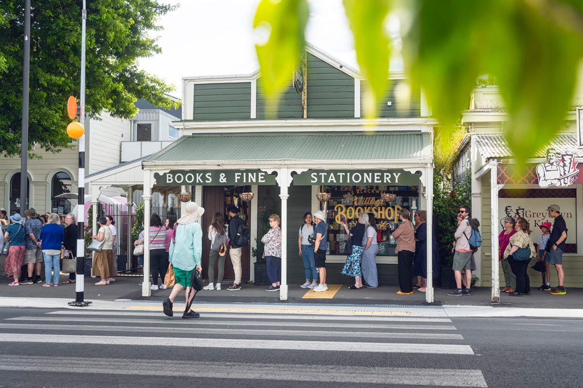 People lining up outside a bookstore