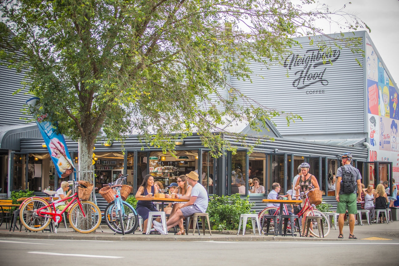 People sitting outside cafe