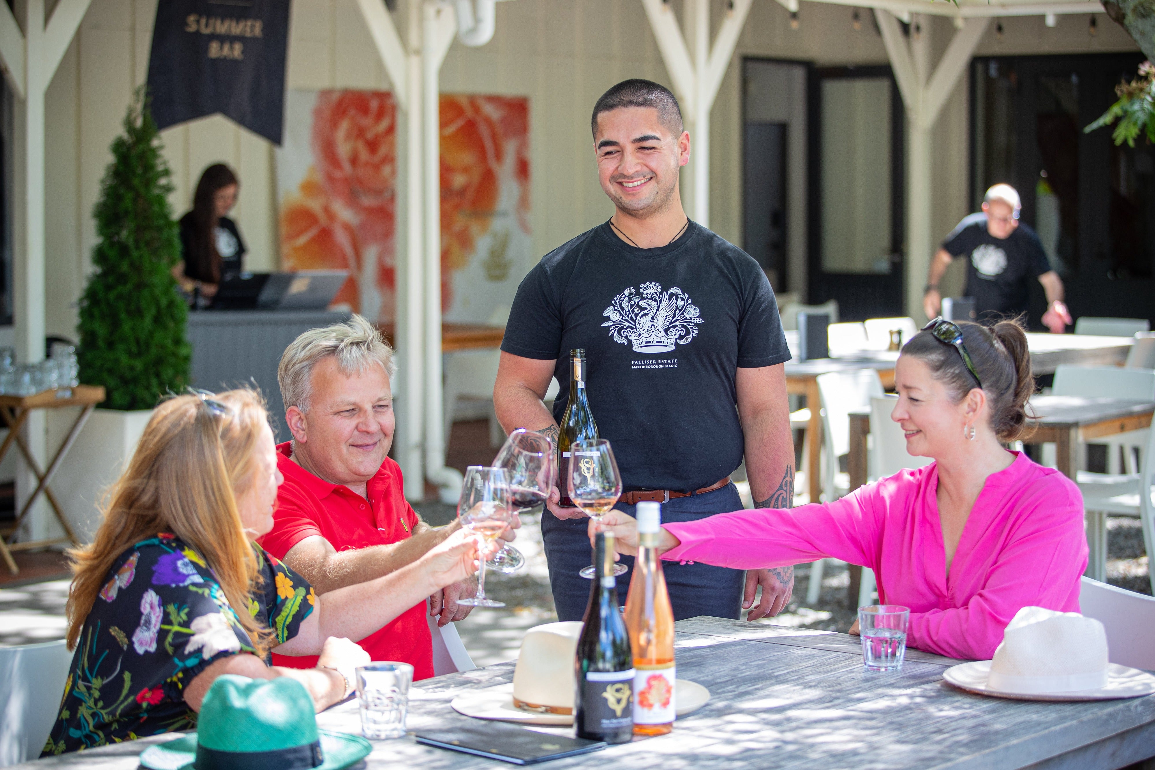 People toasting wine glasses 