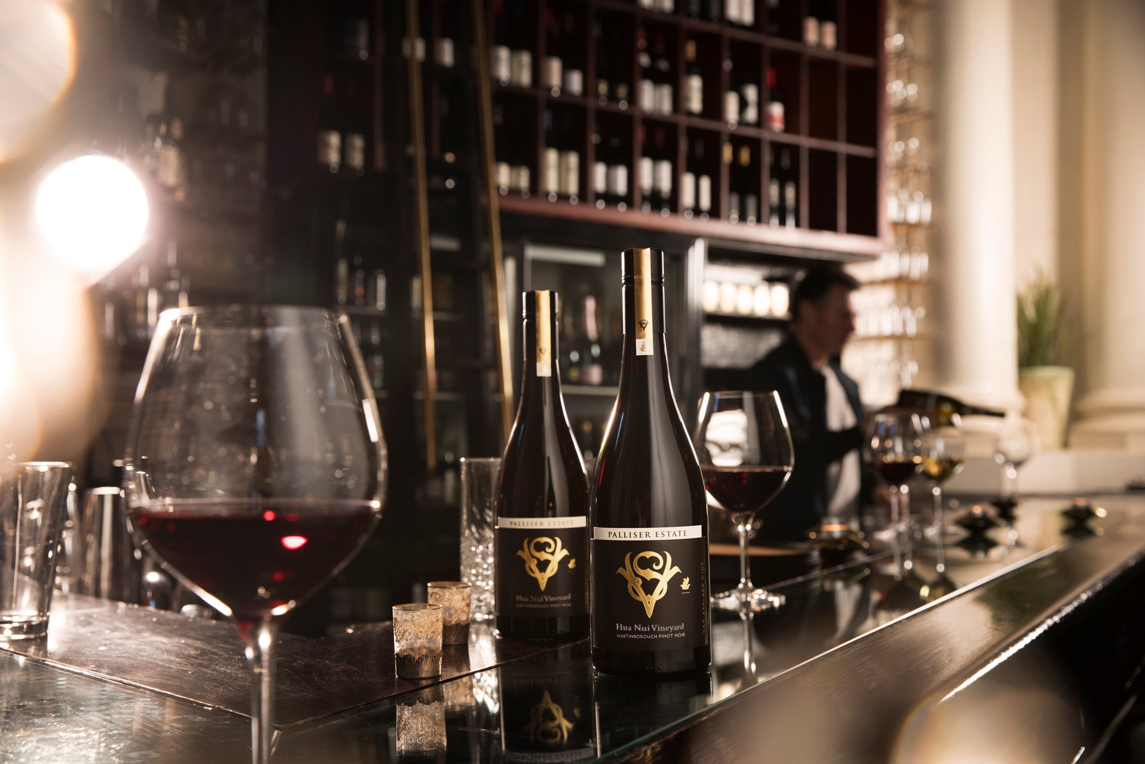 Close up of wine bottle on bar 