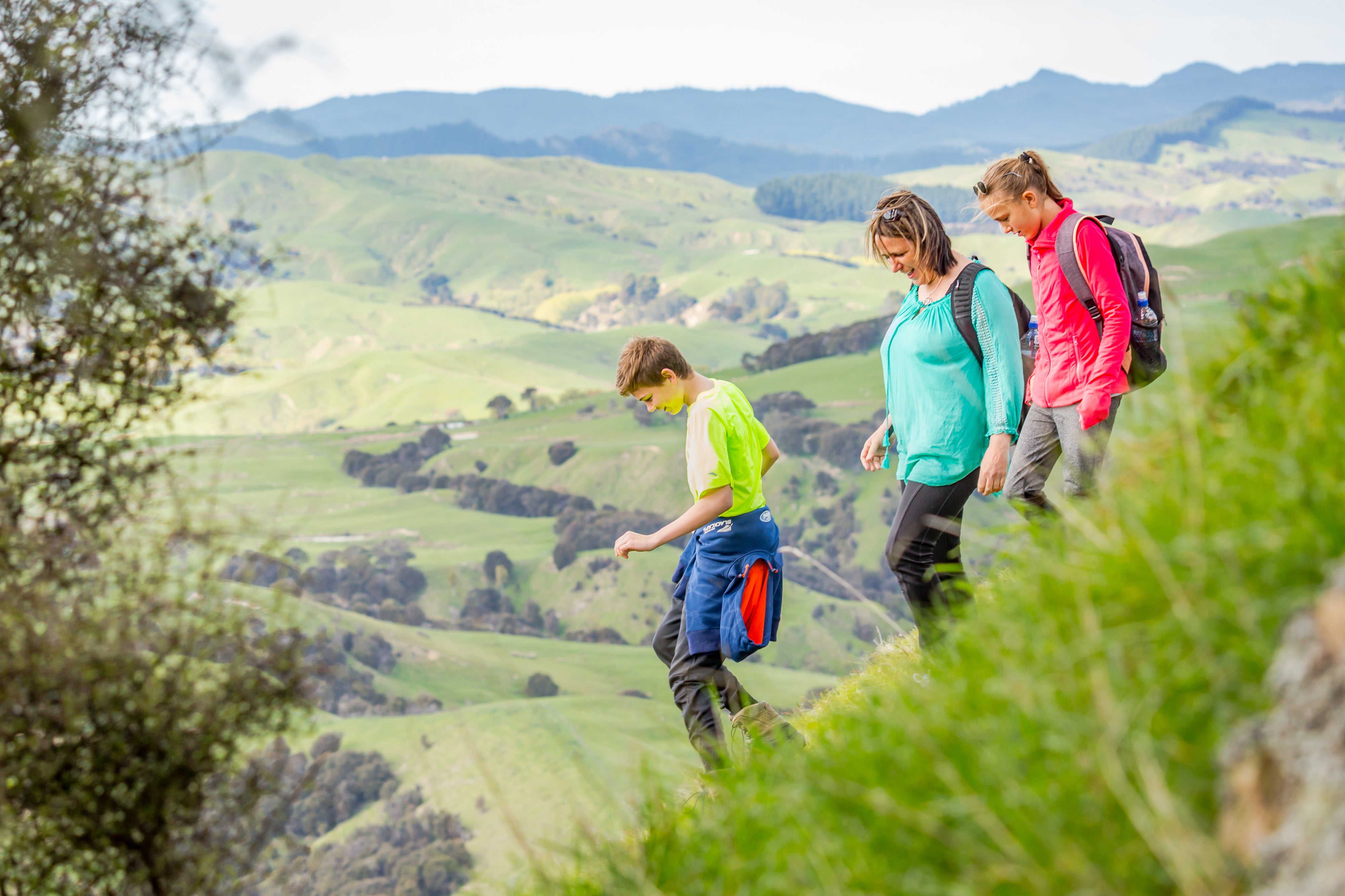 Family walking down hill 