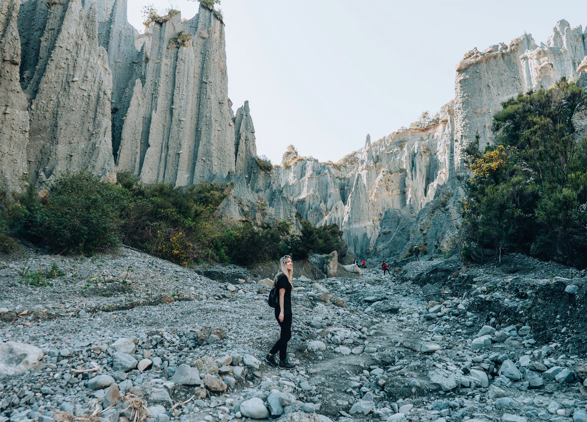 Lady in front of rock formations 