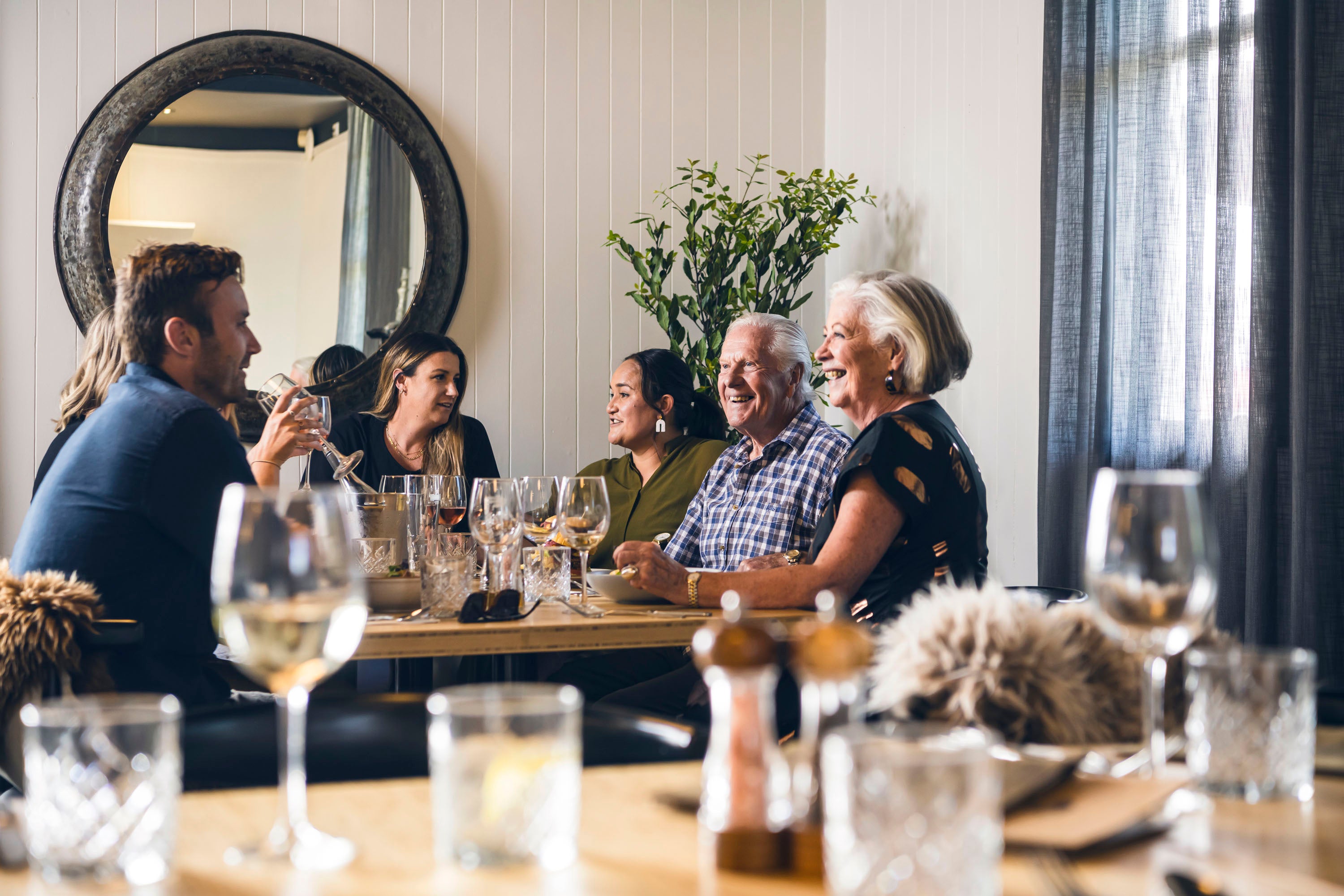 People around table talking 