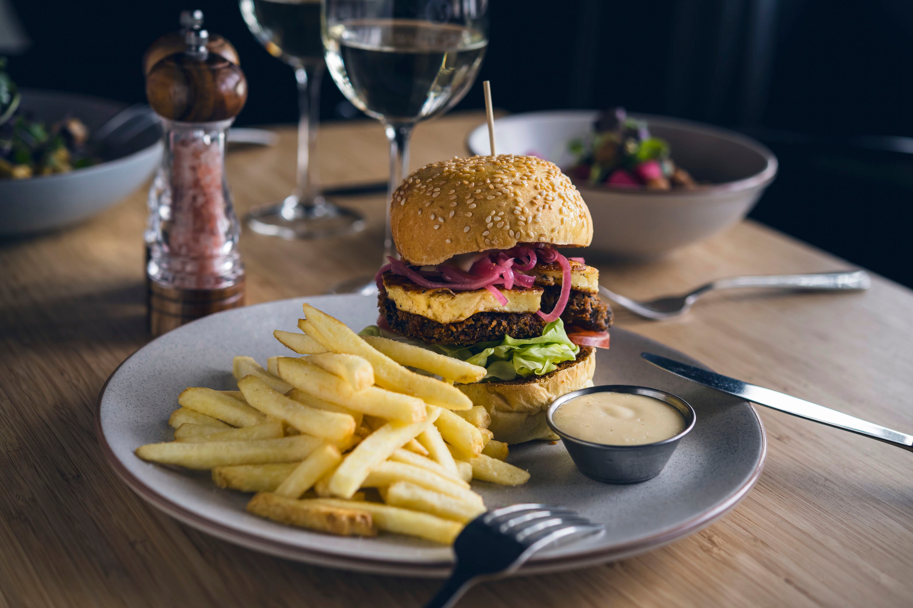 Burger on plate at table 