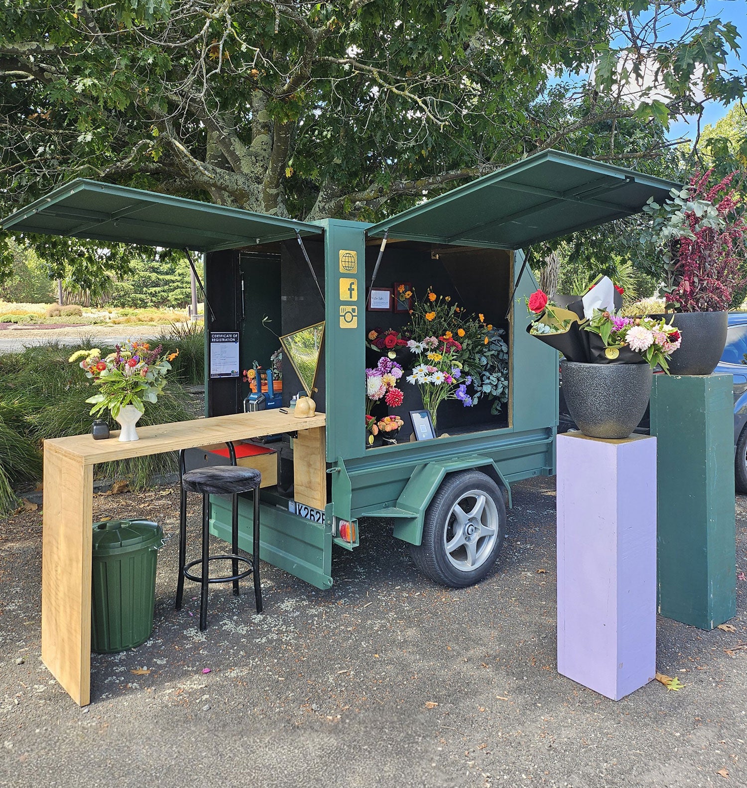 Mobile florist cart full of flowers